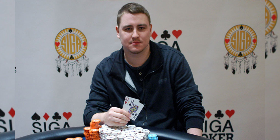 SIGA poker champion sitting at gaming table
