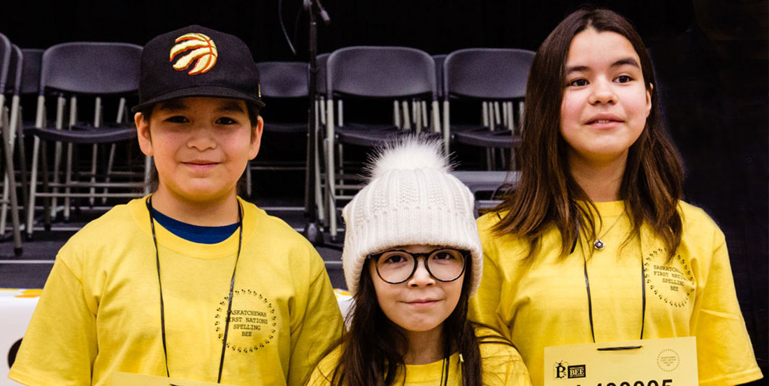 Youth in yellow shirts for spelling bee