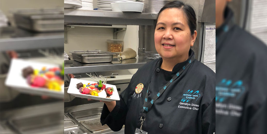 Award winning Prince Albert chef holding plate of food